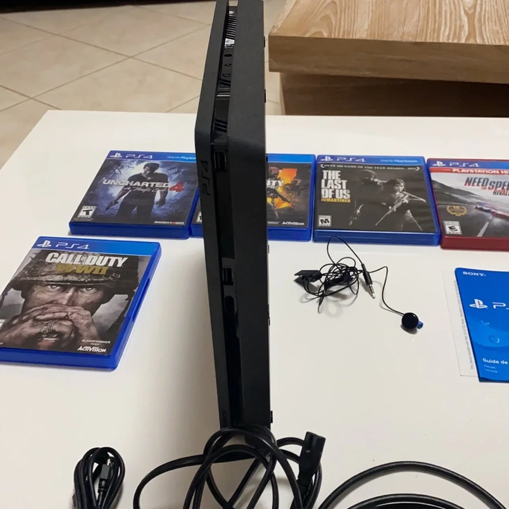 PlayStation 4 Slim 1TB Console and 5 Games
